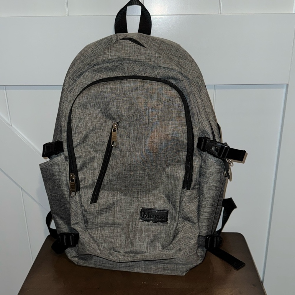Closet Clear Out Sale!  Mancro tech backpack